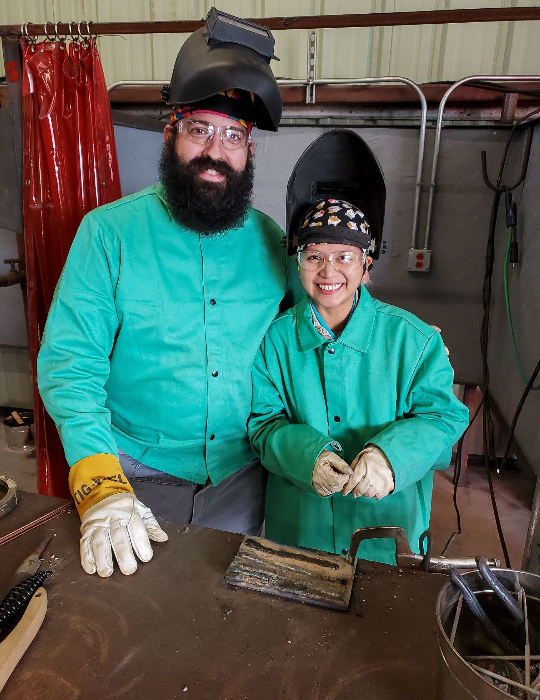 A photo of Chris and Shiela after the welding lesson.